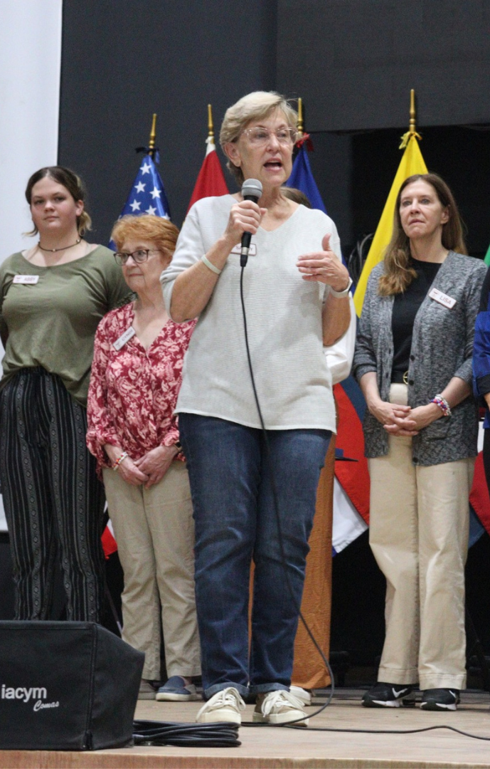 Woman speaking on stage